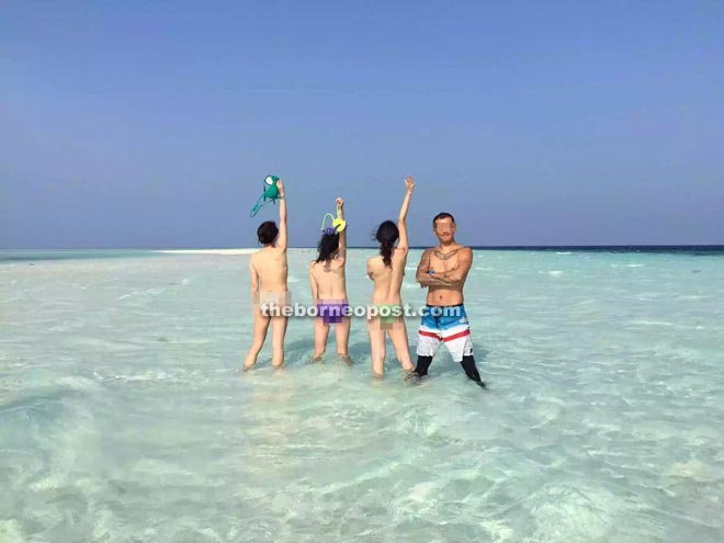Photos of tourists allegedly stripping naked an an island in Semporna that have since gone viral in the social media.