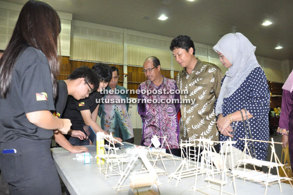 Haris (third right) together with Kameri (second right) are seen checking on an exhibition prior to closing the programme.