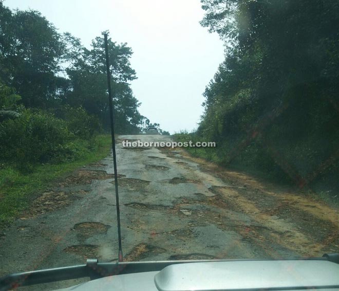 A section of the road from Long Semadoh to Ba Kelalan is full of potholes.
