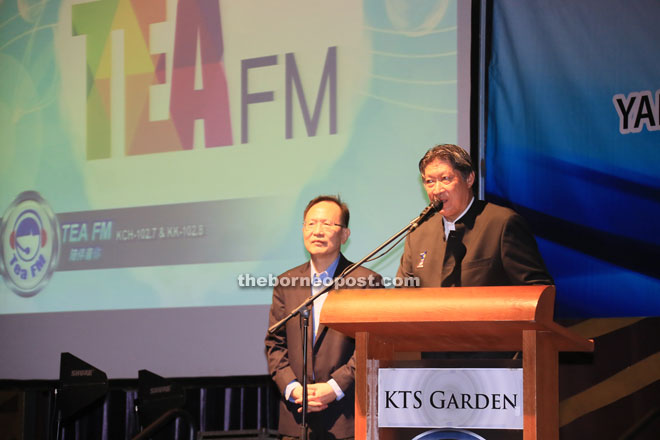 Lau (left) and Siew on stage to introduce Tea FM to the guests.