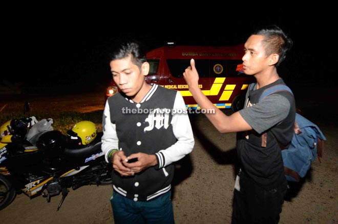 Shahrizal and Azmi describing what they saw.–Photo by James Tseu.