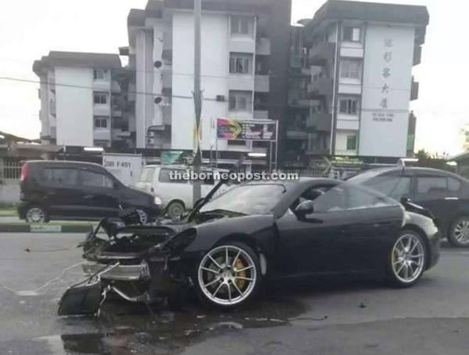 The black sports car after the accident. 