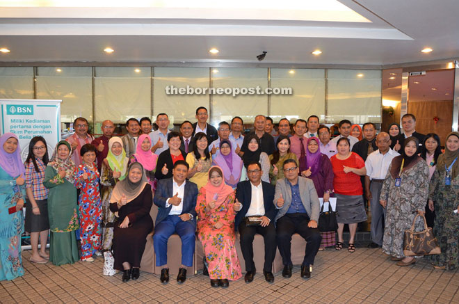 Zamri (seated second right) at the BSN appreciation high tea with Wan Munaidi (second left), Rogayah (centre) and personnel from the Ministry of Education. — Photo by Wilfred Pilo