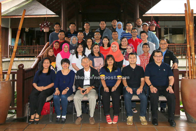 Dris (front, third left) in a photo-call with the Greater Azam management and staff as well as retreat facilitators.