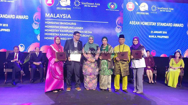 Deputy Minister of Tourism and Culture Malaysia, Datuk Mas Ermieyati Samsudin (third left) with the top five homestay owners from Malaysia who received the Asean Homestay Award at Sofitel Philippine Plaza Manila hotel in the Philippines on Jan 22. Jamilah representing Kampung Santubong Homestay is at third right.