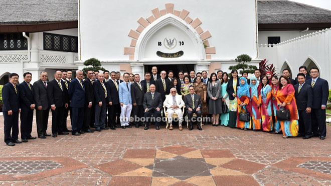 Taib (centre) poses for a photo with the MBKS councillors. — Penerangan photo