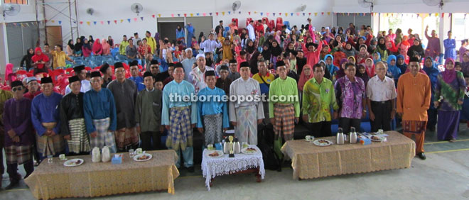 Entri (sixth right) with Muslims during Maulidul Rasul celebration at Beluru, Bakong last Sunday.