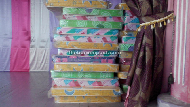 The pile of new mattresses and other items for boarding students to be distributed after registration has been concluded at SMK Sundar.