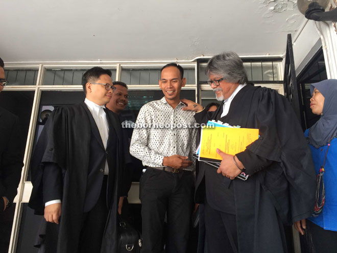 Rizal (second left) with his counsel Ram (second right) and Rizwandean (left) after the Appeals Court's decision. yesterday.