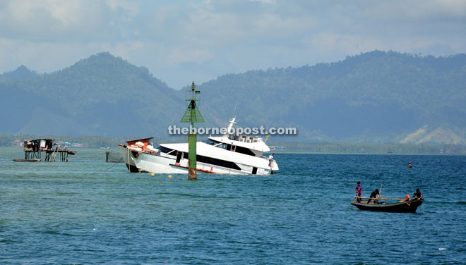 The capsized ferry after colliding with a barge off Semporna on Wednesday night.