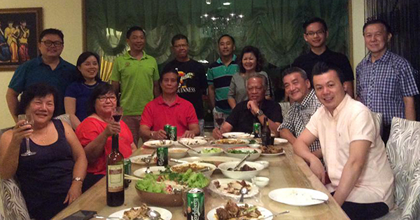 Kelvin Tan at home with family and friends. 