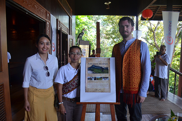 General manager of Aiman Planet Borneo Group of Companies Mona Abdul Manap (left), and Aiman Batang Ai Resort and Retreat guest relations and activities manager Ramona Ngalih with Brooke after the signing ceremony of the ‘Fort Alice Escapade’ brochure.