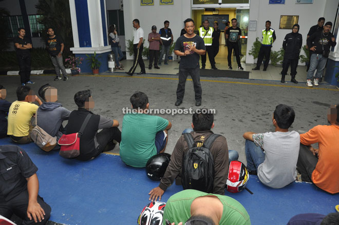 Traffic offenders being briefed by one of the on-duty traffic police personnel during ‘Ops Samseng Jalanan/Ops Mabuk’ held over the weekend in Miri.