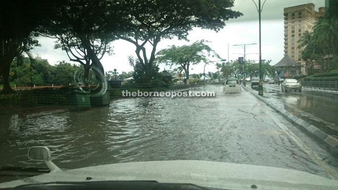 A section of Jalan Tun Abdul Rahman inundated by flash flood yesterday.