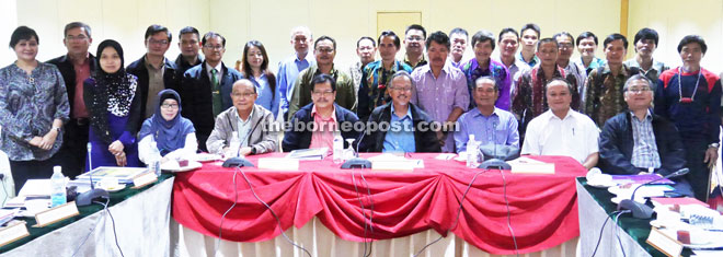 Sapuan (seated centre) during a photo call with the delegation. 