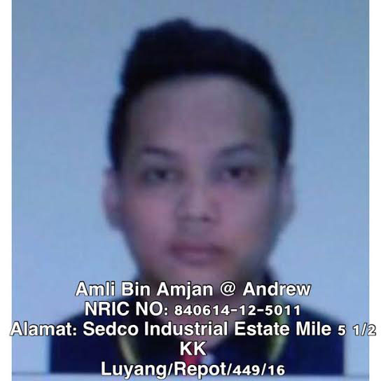 Amli Amjan @ Andrew is wanted by the police.