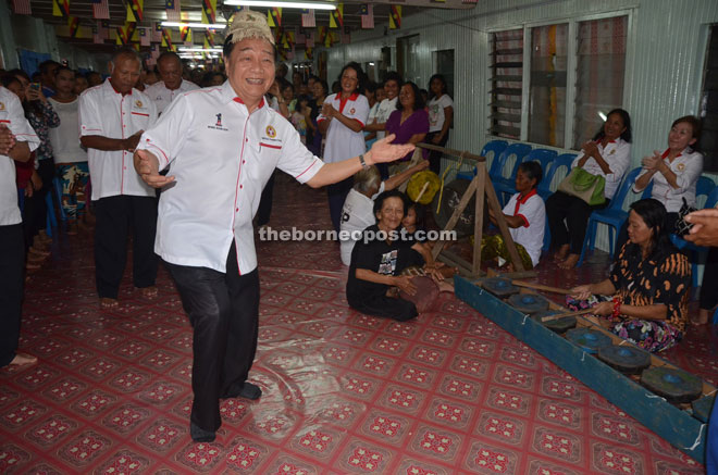 Wong doing a ‘Ngajat’ dance at Rumah Joseph Jarrau.