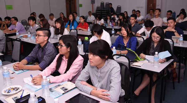 A view of participants concentrating during a presentation.