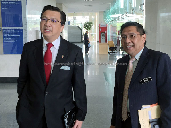 Liow and Azharuddin (right) talking to the press. — Bernama photo