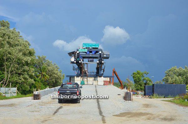 Photo shows the construction site of the bridge across Sungai Rimbas.