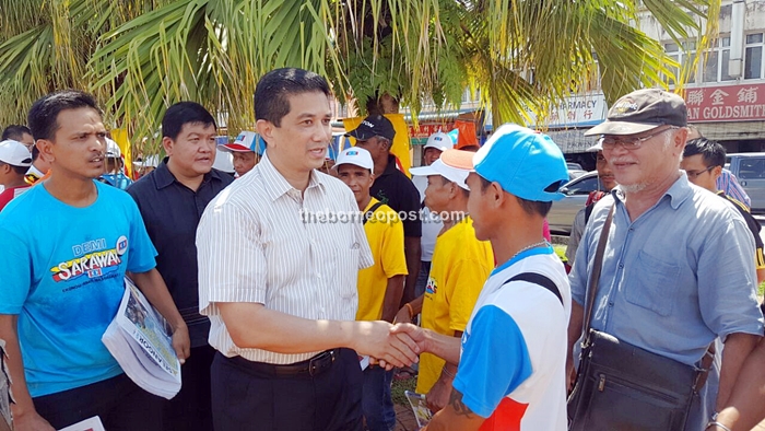 Azmin (second, left) seen greeting local who attended the PKR rally held at Siburan today.