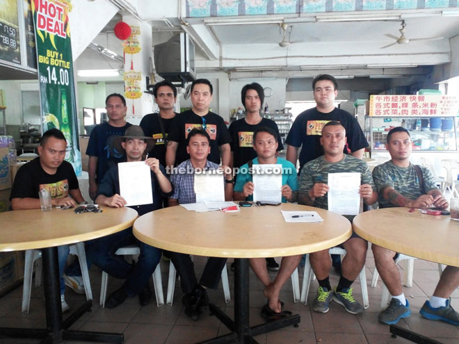 Bill (seated third left) and other Pedas members after their press conference yesterday.