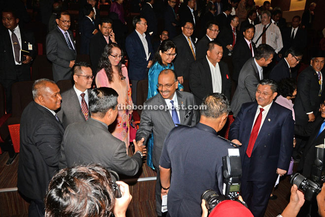 Ali (centre) greeting the participants upon his arrival for the KSN Annual Lecture. Also seen is Morshidi (right). — Photo by Penerangan 