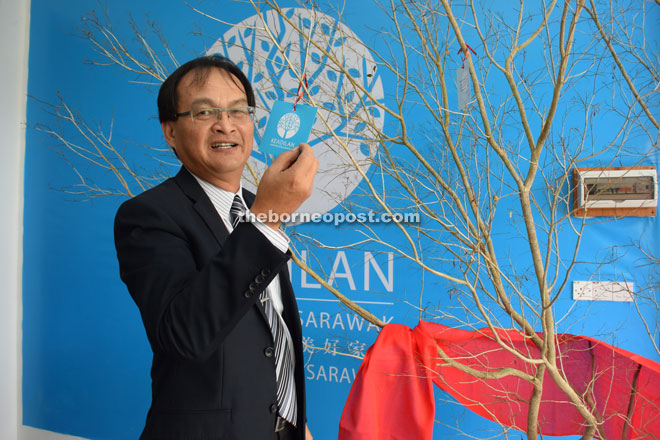 Baru shows the wish card hung on the ‘Tree of Justice’.
