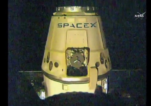 This NASA TV image shows the SpaceX Dragon cargo ship just after release from the Canada Arm for departure to Earth from the International Space Station, on May 11, 2016, NASA TV/AFP