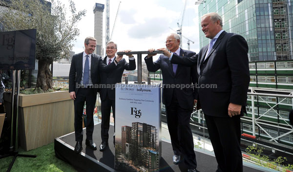 Najib during a cermony at Embassy Gardens. Also seen are chairman of  Eco World Ballymore Holdings Tan Sri Liew Kee Sin (second left), director of Ballymore UK John Mulryan (left) and Lord Marland, chairman of Commonwealth Enterprise and Investment Council (CWEIC). — Bernama photo 