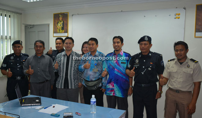 Mohd Marzuki (fourth right), (from fifth right) Bianus, Wan Sudiman and others gearing for the Gawai and school holidays operation.