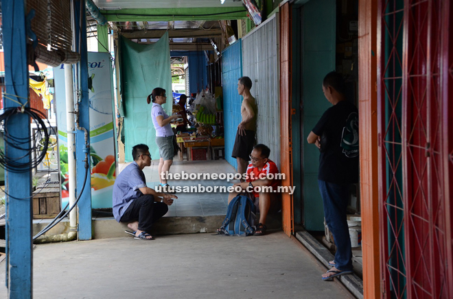 BAT6 interviewing traders at the five-footway of their shops in Spaoh town.