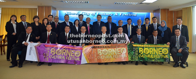 Tiong (seated fifth right) holding BCF banners together with SMC councillors.
