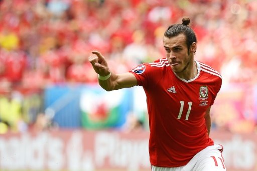 Wales forward Gareth Bale celebrates after scoring during the Euro 2016 Group B match against Slovakia in Bordeaux on June 11, 2016, by Andrew Gwilym | AFP photo
