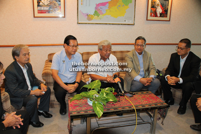 Masing (centre) fields questions from the press. Seen from left are Paulus and Lee. 