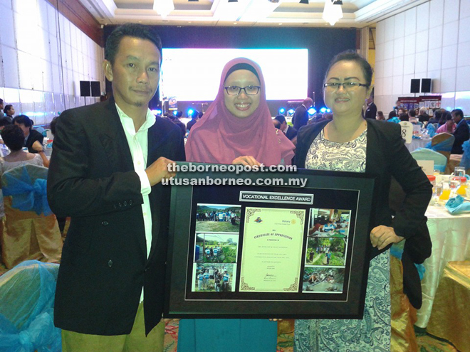 From left: Aznan Johan, Maya Ramdan and Esther Toinin who were awarded the Excellence Vocational Award by the Rotary Club of Kota Kinabalu South recently.