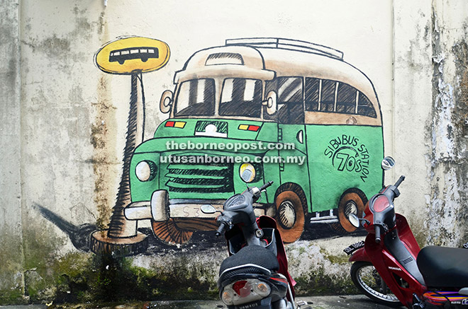 The old bus painting at a lane in Blacksmith Road.
