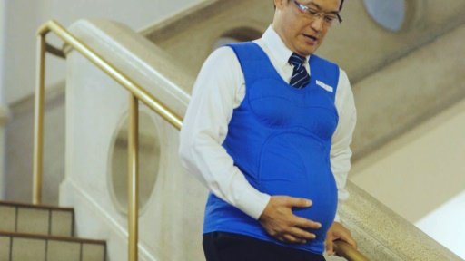 Kyushu-Yamaguchi Work Life Balance Promotion Campaign/AFP | Japanese politician Shunji Kono wears a pregnancy vest in a video filmed by the Kyushu-Yamaguchi Work Life Balance Promotion Campaign -AFP photo
