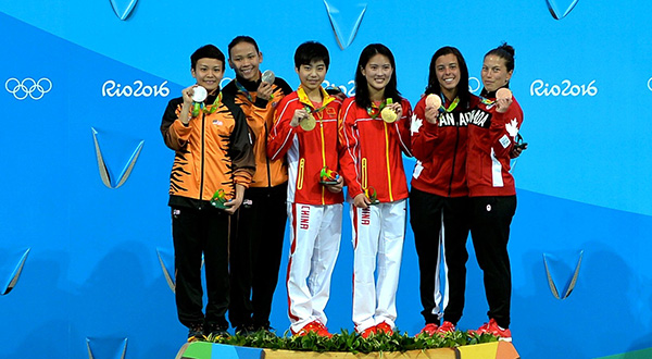 (From left) Malaysia’s Olympic silver medallists Cheong Jun Hong and Pandelela Rinong Pamg are seen with gold medallists Chen Ruolin and Liu Huixia from China as well as bronze medallists from Canada Meaghan Benfeito and Roseline Filion on the podium for the women’s synchronised diving 10-metre platform. — File photo