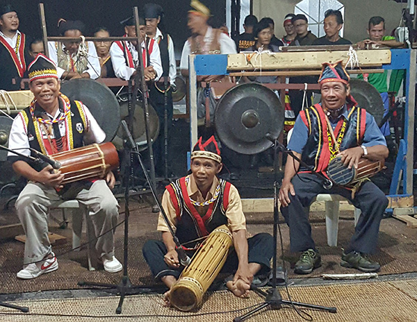 The Rabak Kham Cultural Club performers with  the rhatong player in the middle.