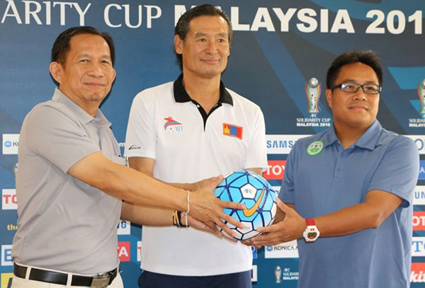 Head coaches (from left) Valakone, Inai and Tam posing for a photo-call after the press conference at Stadium Negeri yesterday.
