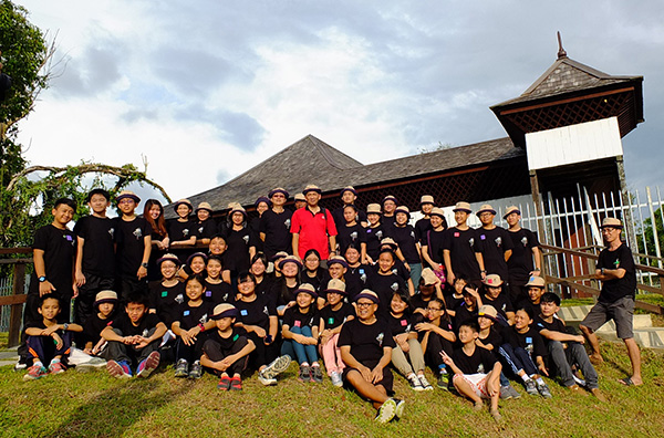 A photo-call for the participants and facilitators at Fort Alice.