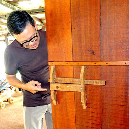 Mike Boon showing the traditional lock mechanism.