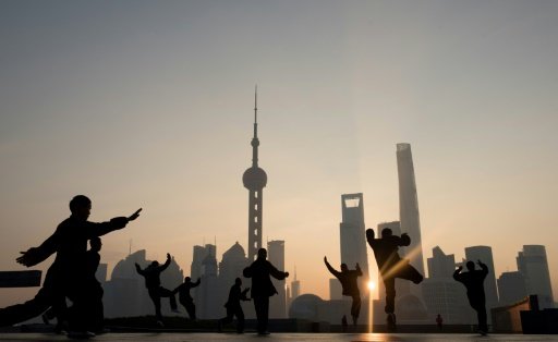 Morning exercises in front of the Lujiazui financial district in Shanghai by Fabien ZAMORA | AFP photo