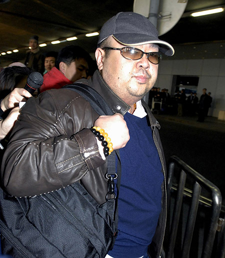 This photo taken on Feb 11, 2007 shows a man believed to be Jong-Nam, walking among journalists upon his arrival at Beijing’s international airport. — AFP photo