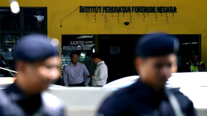 Malaysian police stand guard outside the forensic wing at the Hospital Kuala Lampur on Feb 15, 2017. AFP Photo